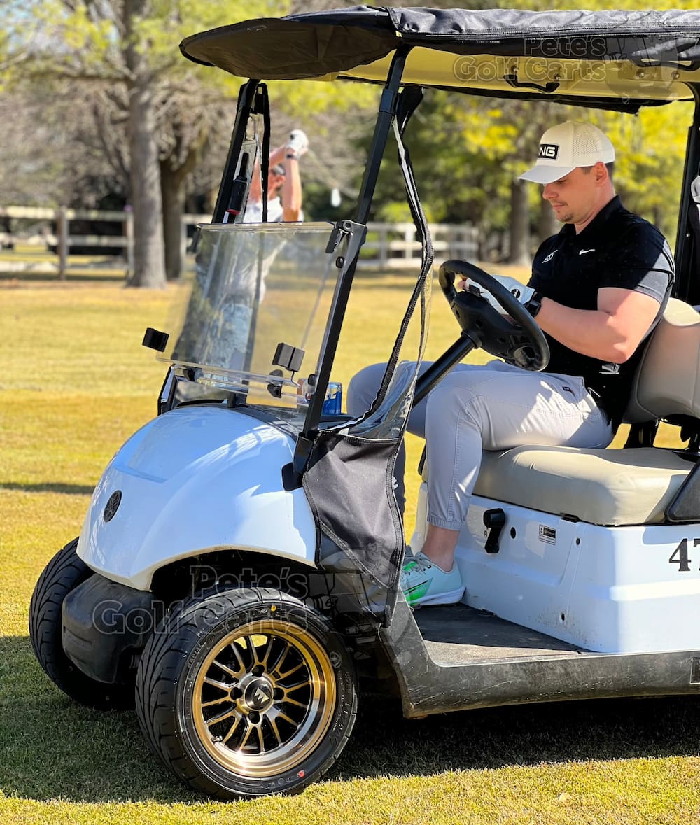 12-inch-Wheel-mate-type-v-bronze-black-golf-cart-wheels-215/40R12-kenda-kruzer-street-turf-golf-cart-tires-on-stock-yamaha-g29-drive-petesgolfcarts-grant-sassaman-black-squirrel-golf-course-goshen