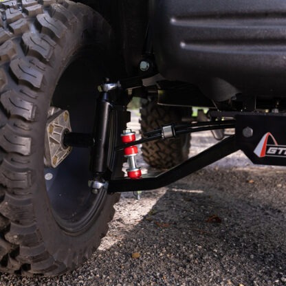 Close up view of the front suspension assembly details on the GTW 4" Yamaha Drive and Drive2 solid rear axle lift kit.