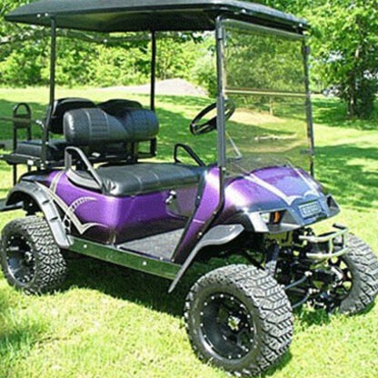 Older TXT gas model golf cart with Jake's 6210 long travel lift kit installed and 23" tall wheels and tires.