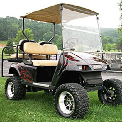 EZ-GO TXT golf cart with a Jake's 6" spindle lift kit installed and 23" tall tires and wheels.